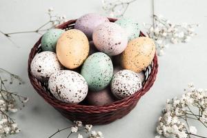Hand painted pastel colored Easter eggs background. Happy Easter greeting card or invitation. photo