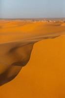 Beautiful sand dunes in the Sahara Desert in Morocco. Landscape in Africa in desert. photo