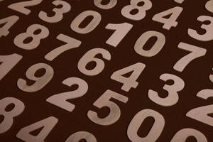 Background of numbers. from zero to nine. Numbers texture. Finance data concept. Mathematic. Seamless pattern with numbers. financial crisis concept. Business success. photo