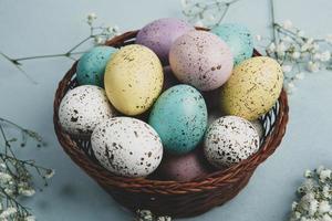 Hand painted pastel colored Easter eggs background. Happy Easter greeting card or invitation. photo