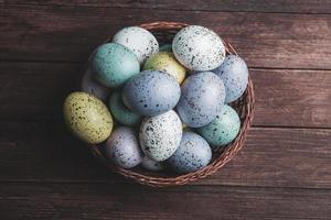 Hand painted pastel colored Easter eggs background. Happy Easter greeting card or invitation. photo