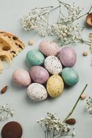 Hand painted pastel colored Easter eggs background. Happy Easter greeting card or invitation. photo