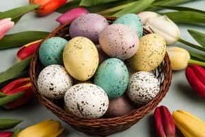Hand painted pastel colored Easter eggs background. Happy Easter greeting card or invitation. photo