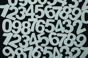 Background of numbers. from zero to nine. Numbers texture. Finance data concept. Matematic. Seamless pattern with numbers. financial crisis concept. Business success. photo
