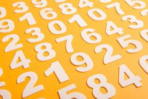 Background of numbers. from zero to nine. Numbers texture. Finance data concept. Mathematic. Seamless pattern with numbers. financial crisis concept. Business success. photo