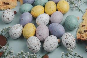 Hand painted pastel colored Easter eggs background. Happy Easter greeting card or invitation. photo