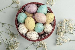 Hand painted pastel colored Easter eggs background. Happy Easter greeting card or invitation. photo