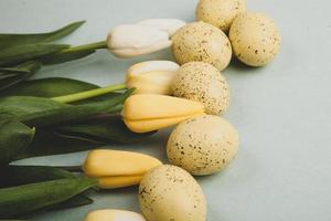 Hand painted pastel colored Easter eggs background. Happy Easter greeting card or invitation. photo