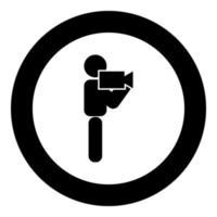 Man with video camera stick icon black color in circle round vector