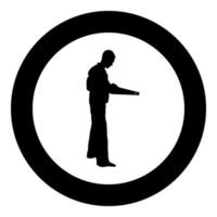 Repairman master man in overalls with tool in his hands hand saw icon black color vector in circle round illustration flat style image