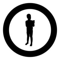 Boy holding smartphone phone Playing tablet Male using communication tool Adolescent looking phone addiction Concept dependency from modern technologies silhouette in circle round black color vector