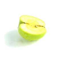 one half of an Apple isolated on white background photo