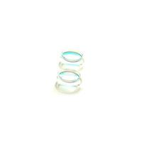 Two contact lenses isolated on white background.Square frame. photo
