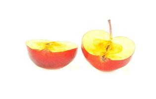 two halves of a red apple isolated on white photo