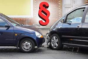 car crash accident with paragraph symbol traffic law or automobile third party insurance concept photo