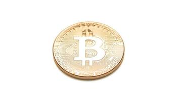 bitcoin cryptocurrency physical coin on white background photo