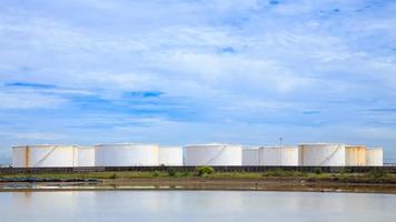 Large white tanks in tank farm for petrol and oil photo