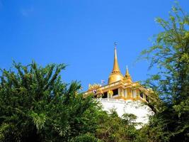 Golden mountain, an ancient pagoda at Wat Saket temple in Bangkok, Thailand photo