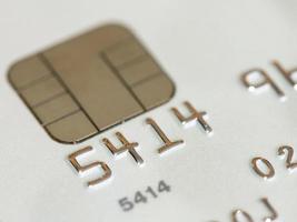 White credit card with micro chip selective focus photo