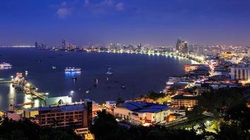 Pattaya city harbor at twilight, Thailand photo