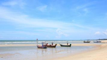 Traditional fishing boat on the beach photo