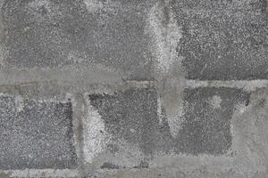 Block concrete, rough gray cement background. photo