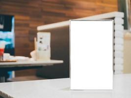 Blank Menu frame on Table in cafe restaurant photo