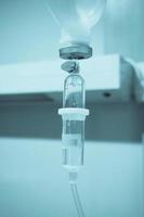 Medical intravenous IV drip in hospital photo