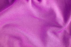Sport clothing fabric texture background, top view of cloth textile surface photo