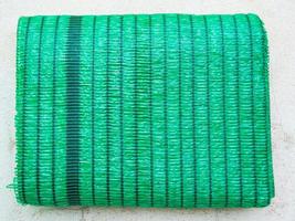 Green Shading Net on the floor ready to install photo
