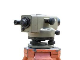 Construction equipment theodolite level tool isolated on white background photo