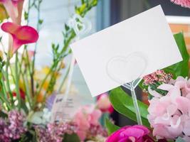 blank white greeting card with flowers bouquet photo