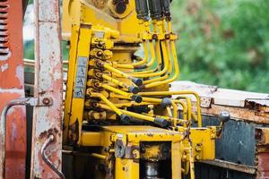 Old crane truck hydraulic control photo