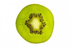 Cross section of fresh kiwi fruit isolated on white background photo