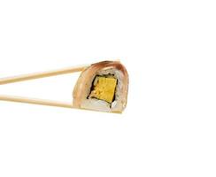 Saba sushi roll in chopsticks isolated on white photo