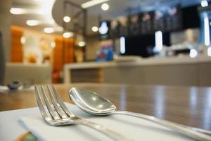 table set with restaurant background photo