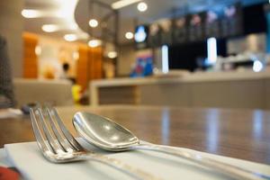 table set with restaurant background photo