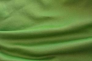 crumpled green fabric texture background photo