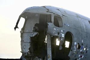 Plane wreck on Iceland beach shore photo