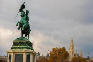 Equestrian statue of Archduke Charles Erzherzog Karl memorial and city hall on a cloudy day  in Vienna Wien, Austria