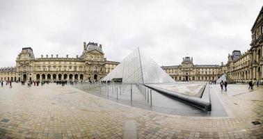 Paris, France, 2018 - View at Louvre Pyramid in Paris, France. Pyramid was completed in 1989 and become a landmark of the Paris