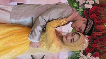 Cianjur Regency West Java Indonesia on June 15, 2021 - A happy couple.  Indonesian Muslim Wedding. photo