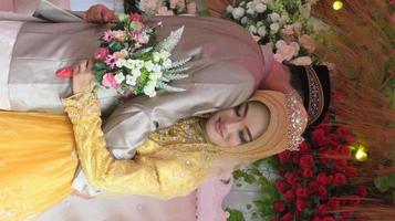 Cianjur Regency West Java Indonesia on June 15, 2021 - A happy couple.  Indonesian Muslim Wedding. photo