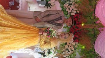 Cianjur Regency West Java Indonesia on June 15, 2021 - A happy couple.  Indonesian Muslim Wedding. photo