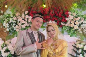 Cianjur Regency West Java Indonesia on June 15, 2021 - A happy couple.  Indonesian Muslim Wedding. photo