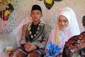 Cianjur Regency West Java Indonesia on June 12, 2021 - A happy couple.  Indonesian Muslim Wedding. photo