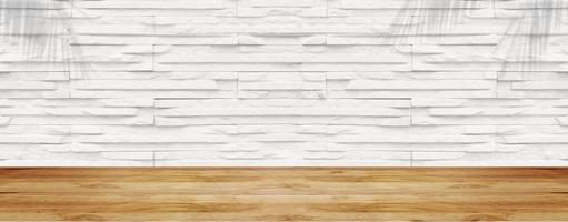 Empty wood table with white stone wall texture background. For display or montage your products. photo