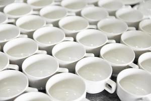 empty coffee cup on the table, white coffee mugs ready to serve in the morning photo