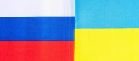 Ukraine. and Russia flags. Pray, No war, stop war, conflict and relationship concept photo
