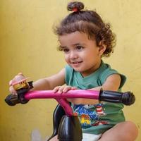 Cute little boy Shivaay driving cycle at home balcony during summer time, Sweet little boy photoshoot during day light, Little boy enjoy cycling at home during photo shoot